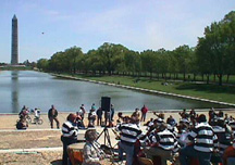 a school band was playing at the foot of the lincoln memorial